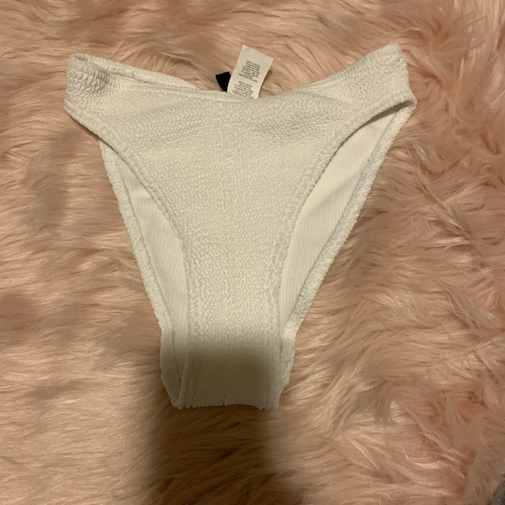 White bikini bottoms never worn - - xs
